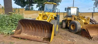 COMBO - 2 X FRONT END LOADERS