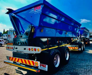 New PR Trailers link side tippers