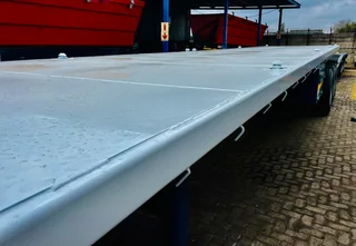 NEW PR Trailer tri axle flat deck