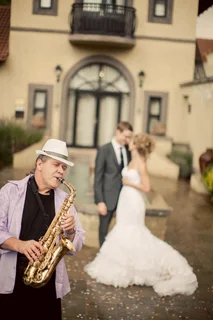 Saxophonist plays Special Celebration.