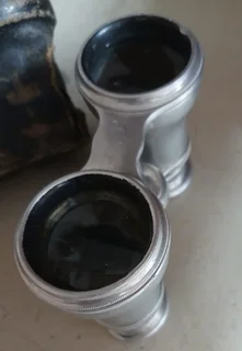 Vintage opera glasses, also known as theatre binoculars. Late 1800s or early 1900s