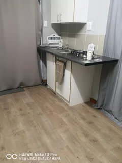 Flatlet fully furnished   Non smokers only near SAMRC...balcony flat upstairs