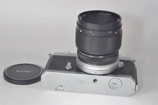 Nikomat FT film camera with 55mm Vivitar Macro lens