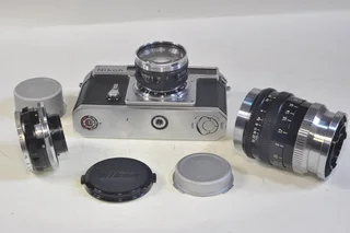 Nikon SP rangefinder film camera with 3 lenses, case etc