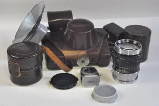 Nikon SP rangefinder film camera with 3 lenses, case etc