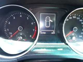 2015 VW polo 1.2Tsi comfortline with 121000km silver color,panranomic sunroof,5speed manual