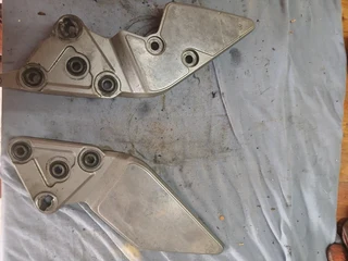 Suzuki bandit 1200 footrest hangers. In good condition.