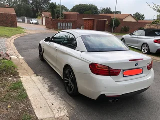 Bmw 420i convertable with red interior