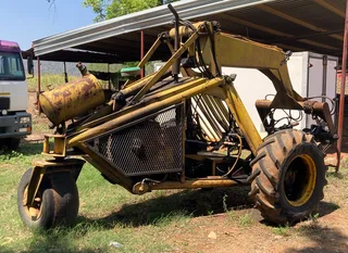 Bell 100 cane loader