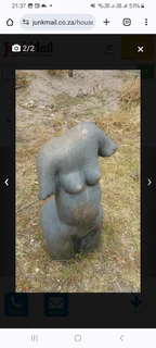 Garden Statue made of Stone very heavy but great conversational piece can be put inside and outside