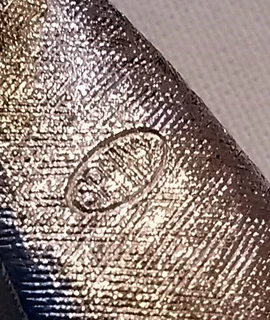 Vintage ‘Ribbon Design’ Brooch with Marcasite stones/silver tone metal by Sphinx