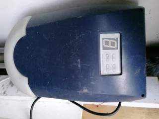 Garage motor with rail and remotes