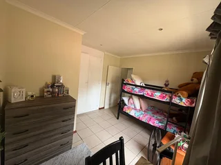 2 Bed, 1.5 Bath duplex townhouse in Mount Grace, 1 lockup garage plus 1 covered parking.