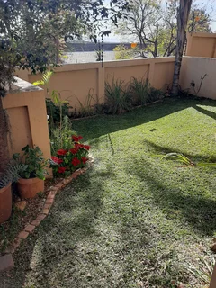 2 Bed, 1.5 Bath duplex townhouse in Mount Grace, 1 lockup garage plus 1 covered parking.