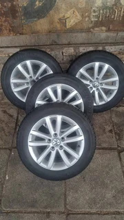14 inch Polo mags with 185/60R14  tires for sale