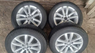 14 inch Polo mags with 185/60R14  tires for sale
