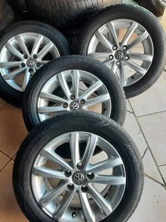 14 inch Polo mags with 185/60R14  tires for sale