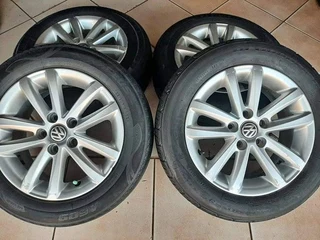 14 inch Polo mags with 185/60R14  tires for sale