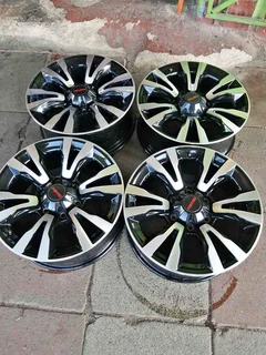 Isuzu bakkie mags size 18 with tyres set originals