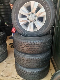 A set of 17inch  hillux Mags and Dunlop tyres