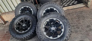 A set of  17inch Land Cruiser mags and tyres with spare rim and tyre