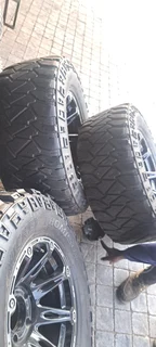 A set of  17inch Land Cruiser mags and tyres with spare rim and tyre