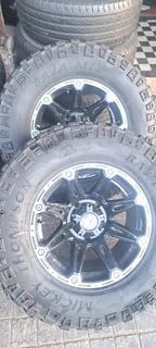 A set of  17inch Land Cruiser mags and tyres with spare rim and tyre