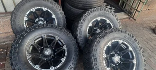 A set of  17inch Land Cruiser mags and tyres with spare rim and tyre