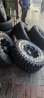 A set of  17inch Land Cruiser mags and tyres with spare rim and tyre