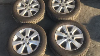 A set of 15inch Toyota corolla mags and tyres like new