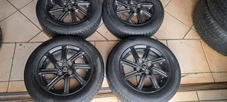 A set of mags and tyres for Toyota Agya