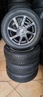 A set of mags and tyres for Toyota Agya
