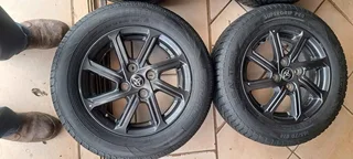 A set of mags and tyres for Toyota Agya
