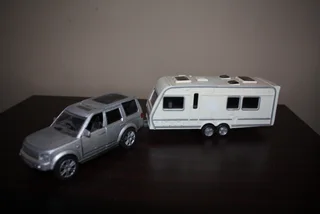 Land Rover Discovery With Caravan. (ref 1035)