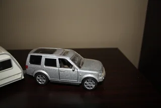 LAND ROVER DISCOVERY WITH CARAVAN. (REF 1035)