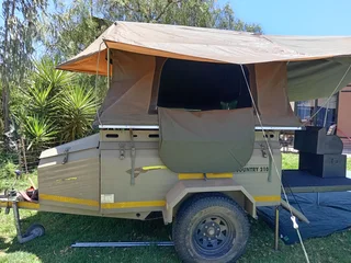 Camper trailer with tent and extras