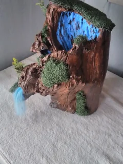 PAINTED/VARNISHED TREE STUMP WITH FOUNTAIN LIKE LOOK, ADD YOUR TOUCH.  FOR SALE AT SEA VIEW/BELLAIR.