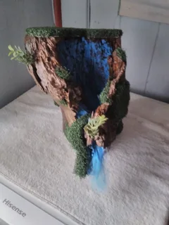 PAINTED/VARNISHED TREE STUMP WITH FOUNTAIN LIKE LOOK, ADD YOUR TOUCH.  FOR SALE AT SEA VIEW/BELLAIR.
