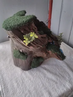 PAINTED/VARNISHED TREE STUMP WITH FOUNTAIN LIKE LOOK, ADD YOUR TOUCH.  FOR SALE AT SEA VIEW/BELLAIR.