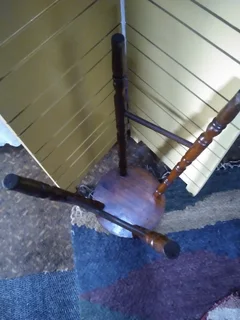 WOODEN TALL TURNED TABLE STAND WITH THREE WOODEN CANDLE HOLDERS FOR SALE AT SEAVIEW/BELLAIR