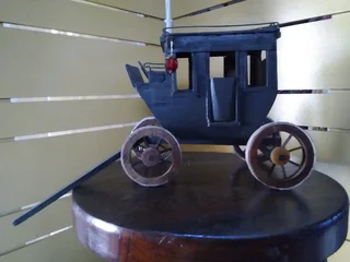 STAGE COUCH WITH METAL SOLDIERS/MUSICIANS FOR SALE AT SEA VIEW/BELLAIR.