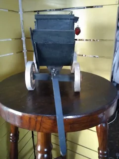 STAGE COUCH WITH METAL SOLDIERS/MUSICIANS FOR SALE AT SEA VIEW/BELLAIR.