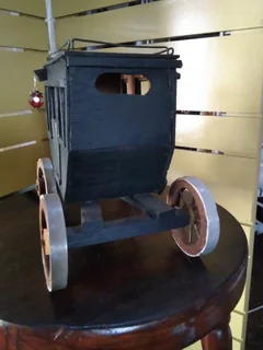 STAGE COUCH WITH METAL SOLDIERS/MUSICIANS FOR SALE AT SEA VIEW/BELLAIR.