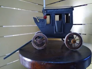 STAGE COUCH WITH METAL SOLDIERS/MUSICIANS FOR SALE AT SEA VIEW/BELLAIR.