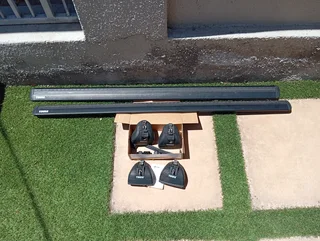 Thule roof rack and fixing brackets for sale. Excellent condition. R3500