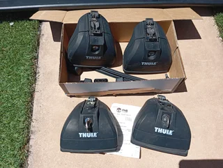 Thule roof rack and fixing brackets for sale. Excellent condition. R3500