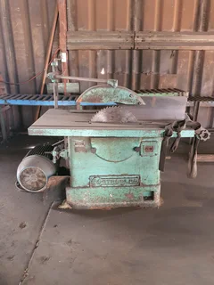 Metalclad single rip wood working machine