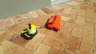 Scuba diving surface marker buoy with reel