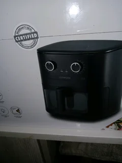 Brand NEW KENWOOD AIRFRYER STILL IN FACTORY SEALED PACKAGE, RECIPE BOOK INCLUDED.