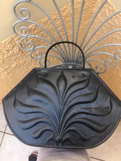 C1910-20 Cast Iron Carrier With Detailing On Both Sid